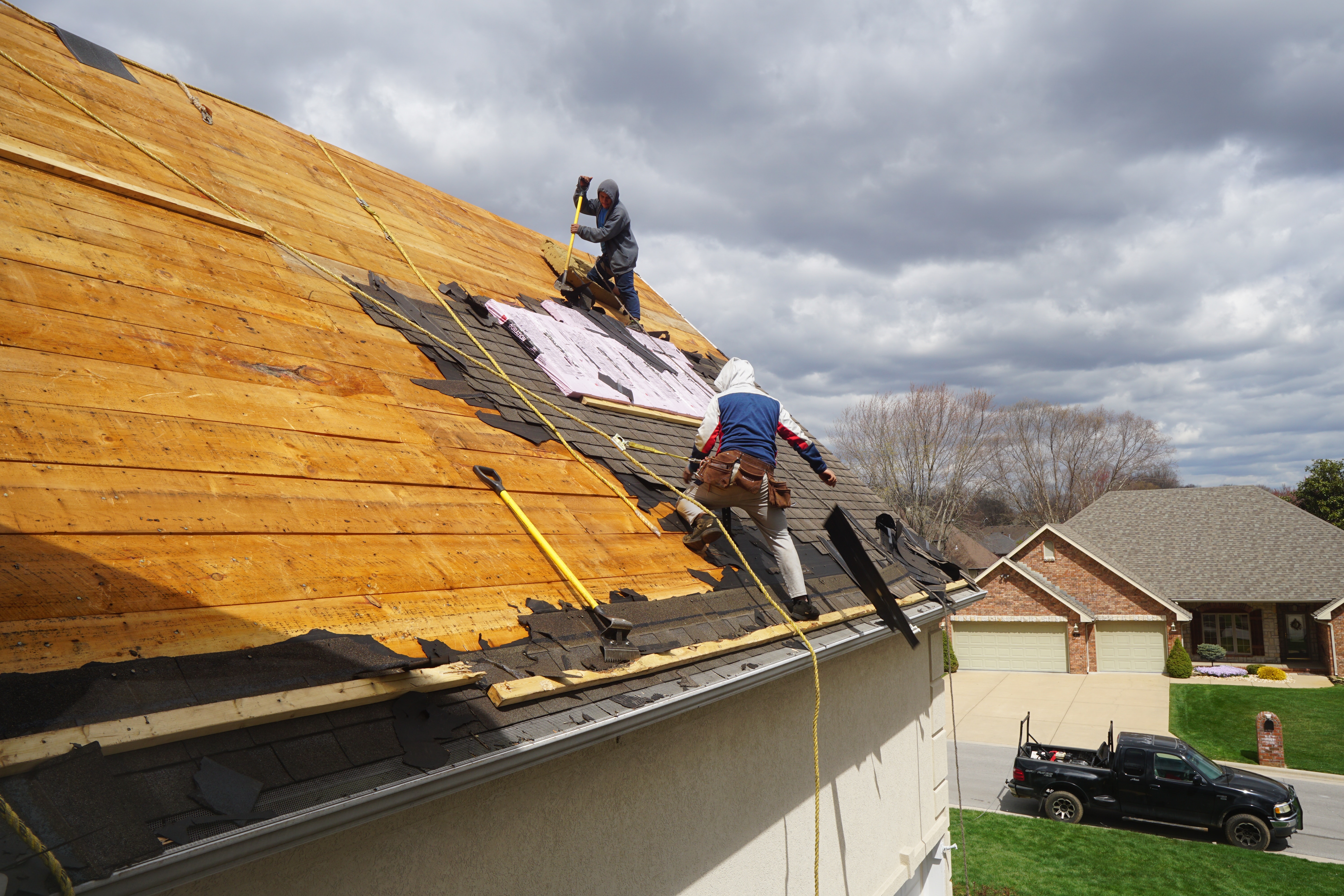 Rolled Roofing vs. Shingles Pros and Cons